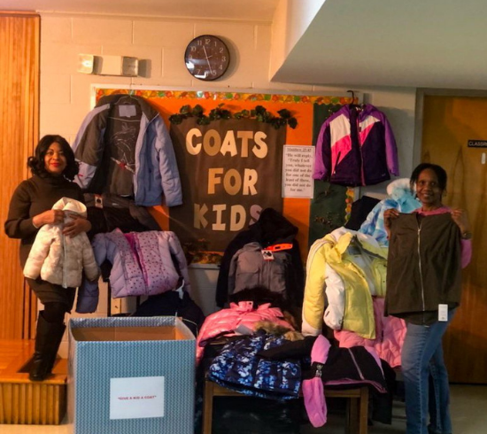 Rosa Rucker members pose after coat drive